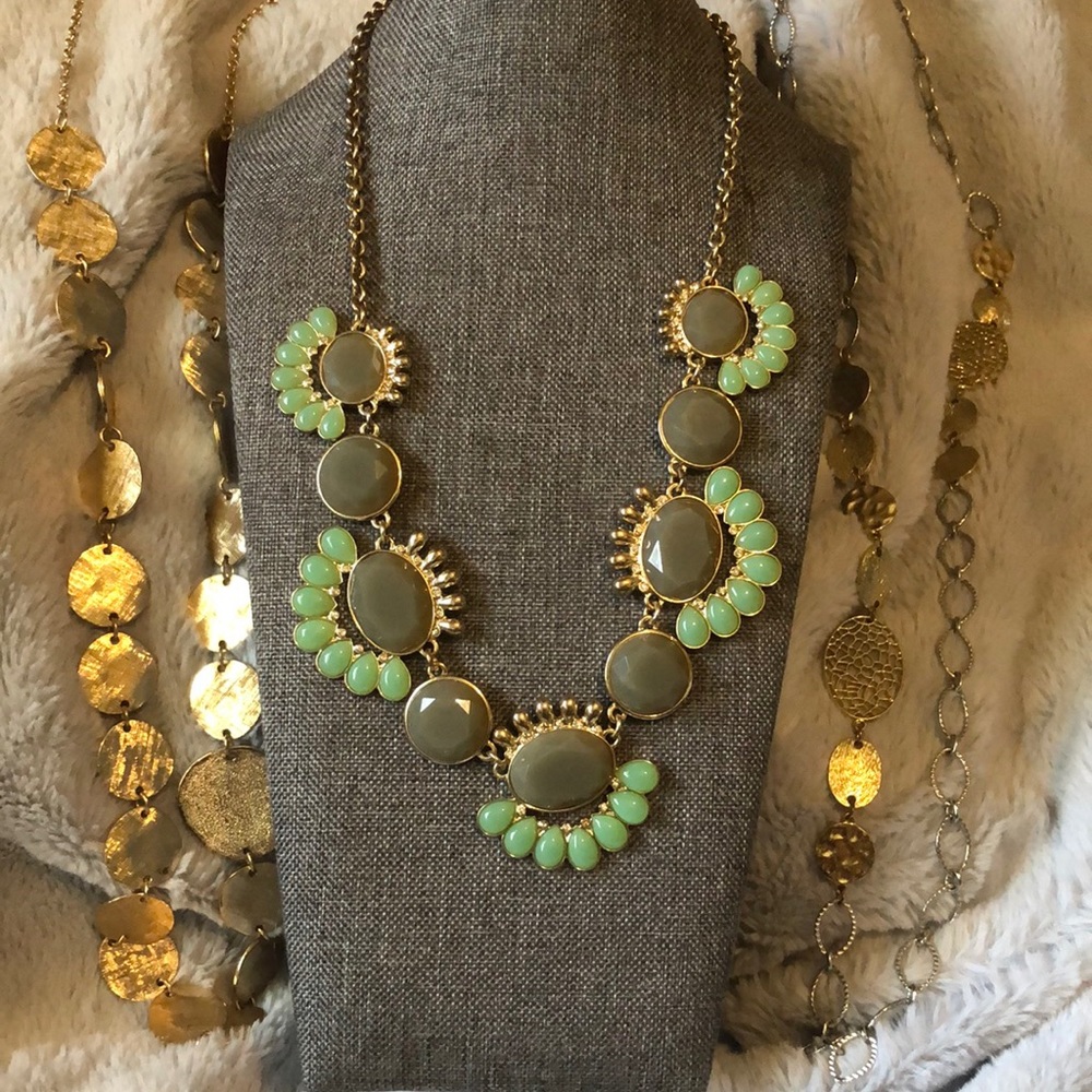 Three necklaces. Two long casual and one statement necklace.